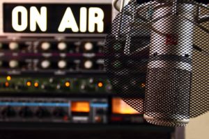On air sign and radio recording booth
