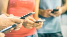 Young people holding phones