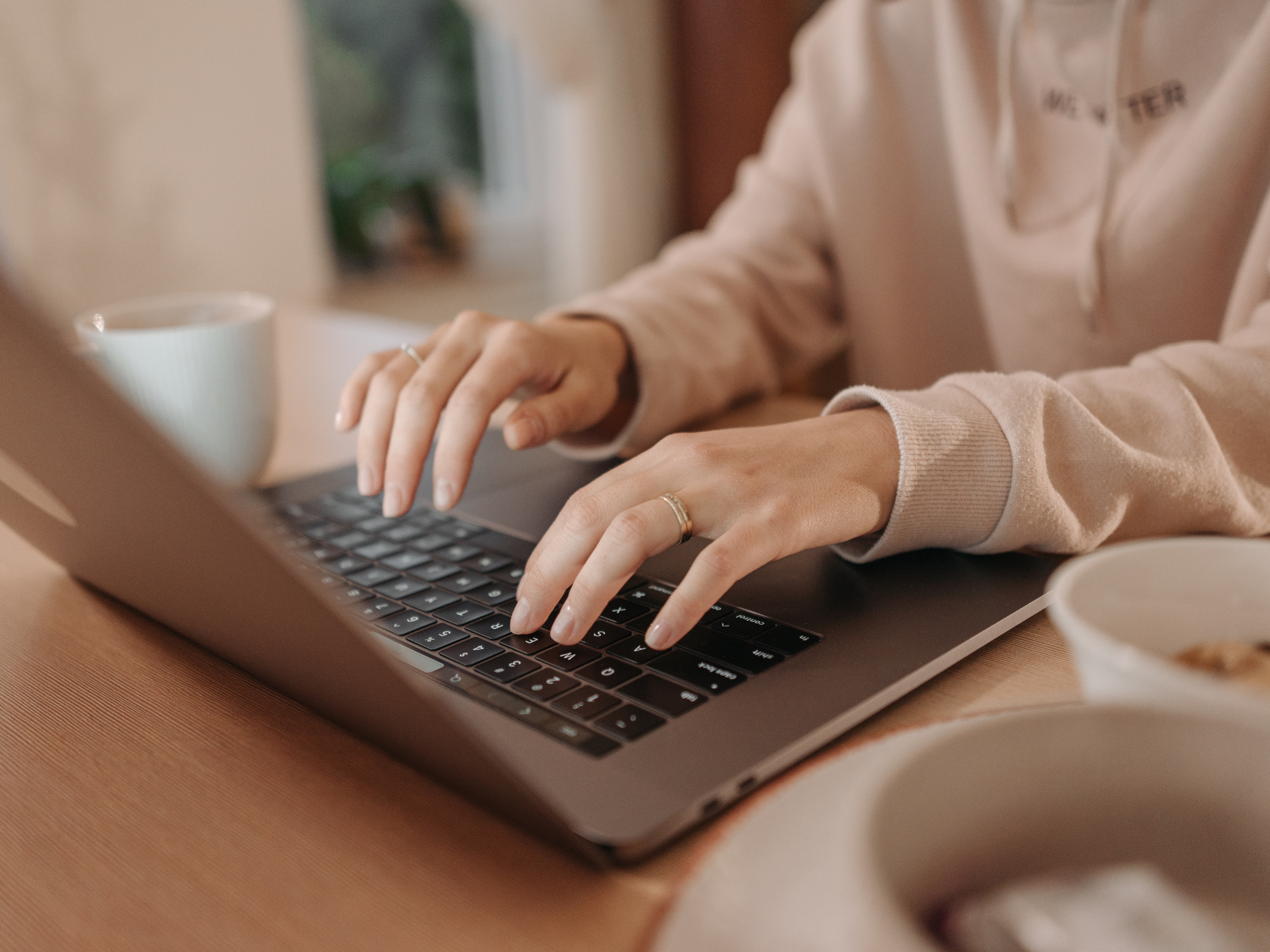 Person using a laptop: digital vs traditional advertising