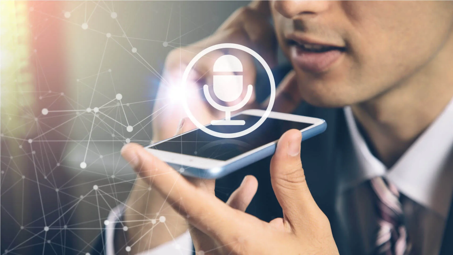 Man using voice search on his mobile phone