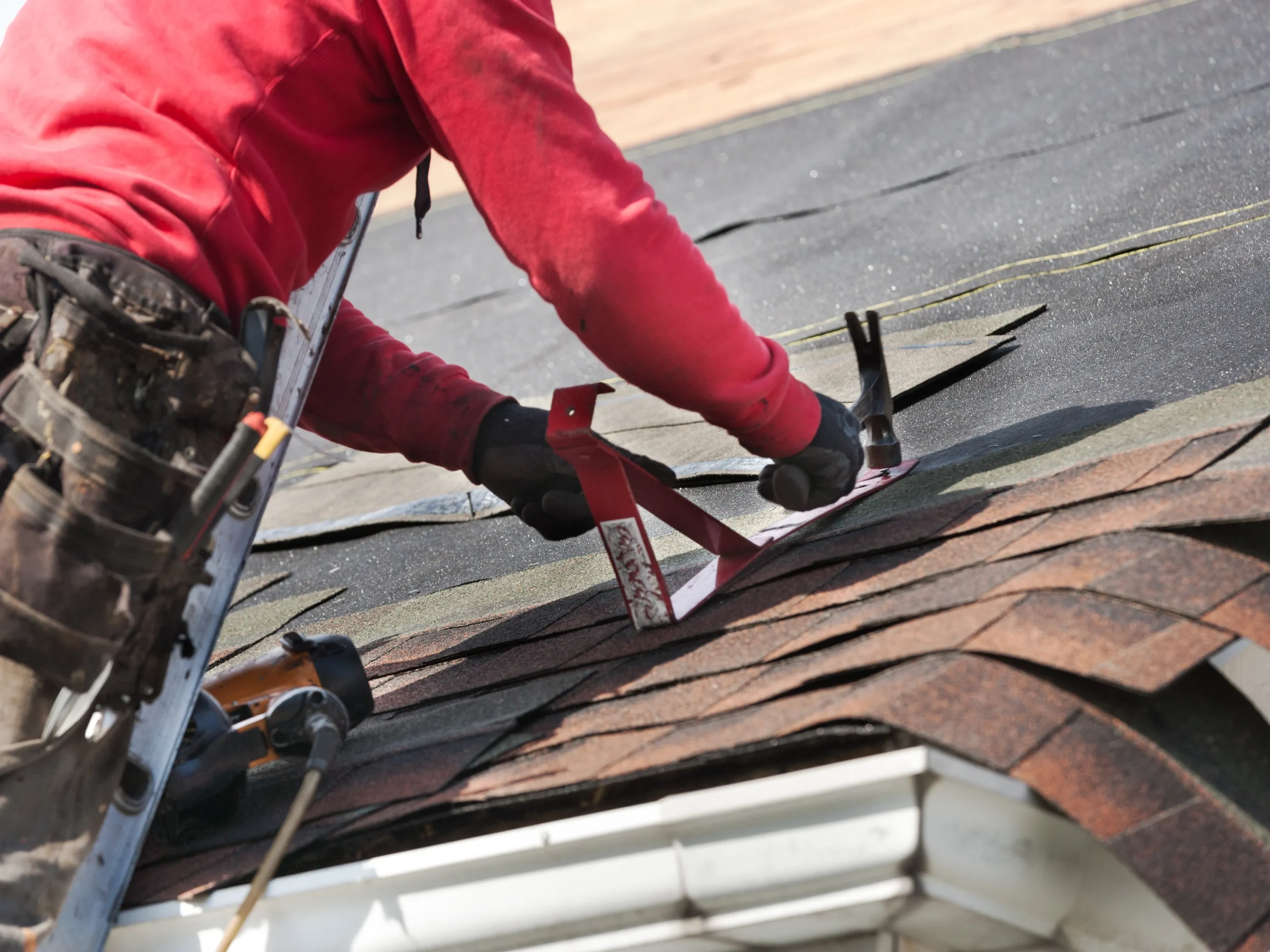picture of person working on roof for home improvement advertising